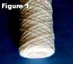Typical diamond shaped open spaces in conventional string wound cartridge